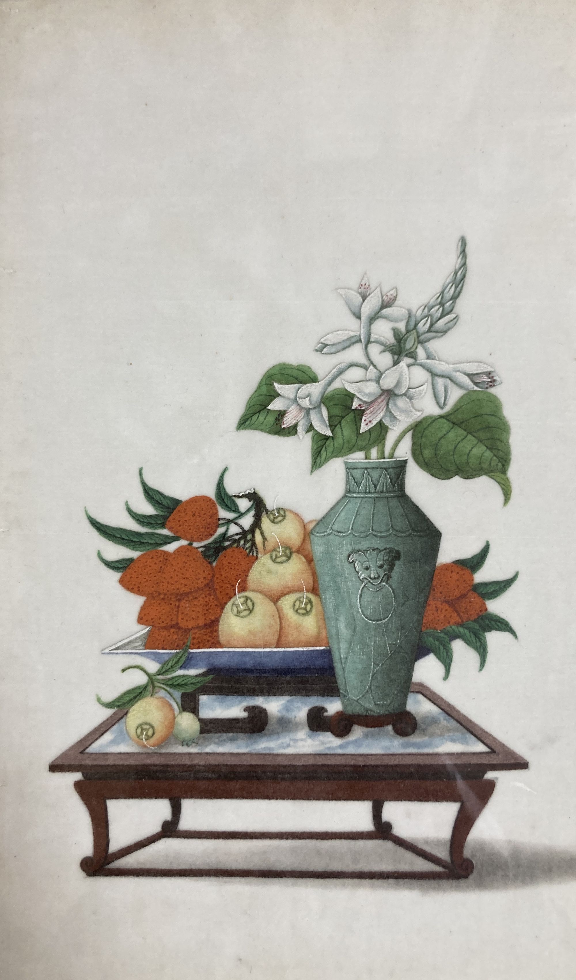 19th century Chinese School, pair of gouache on pith paper, Still lifes of fruit and flower vases on tables, 26 x 17cm